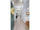 Inviting foyer featuring a view of the second story, hardwood floors, and access to multiple rooms at 5224 Stonewall Dr, Summerville, SC 29485