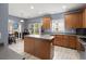 Bright, airy kitchen featuring stainless steel appliances and a kitchen island with bar stool seating at 5224 Stonewall Dr, Summerville, SC 29485