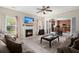 Open-concept living area with fireplace and view of the kitchen at 5224 Stonewall Dr, Summerville, SC 29485