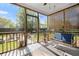 Relaxing screened porch with outdoor seating and views of the backyard at 5224 Stonewall Dr, Summerville, SC 29485