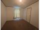 An ample bedroom with carpet and a private door at 570 Crystal Shores Dr, Moncks Corner, SC 29461