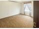 Bedroom with medium-toned carpet, neutral walls, and patterned curtains at 570 Crystal Shores Dr, Moncks Corner, SC 29461