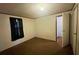 Bedroom with medium-toned carpet, closet, and black out curtains at 570 Crystal Shores Dr, Moncks Corner, SC 29461