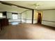 Open living space with carpet and natural light coming in the window, ready for new decor at 570 Crystal Shores Dr, Moncks Corner, SC 29461