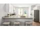 Modern kitchen featuring granite countertops, stainless steel appliances, and white cabinets with plenty of storage at 6254 Gritman Dr, Hollywood, SC 29470