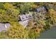 Beautiful aerial view of a home with lush landscaping, mature trees, and a peaceful setting at 66 New Settlement Rd, Kiawah Island, SC 29455