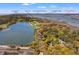 An aerial view showcasing 66 New Settlement near the River Course, Kiawah Island Parkway, and Freshfields Village at 66 New Settlement Rd, Kiawah Island, SC 29455