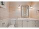 Well lit bathroom with marble countertop, unique sink, and textured wallpaper for a luxurious feel at 66 New Settlement Rd, Kiawah Island, SC 29455