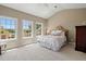 Bright bedroom with large windows offering a picturesque waterfront view at 66 New Settlement Rd, Kiawah Island, SC 29455