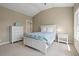 Bedroom featuring a vaulted ceiling, two dressers, and a window at 66 New Settlement Rd, Kiawah Island, SC 29455