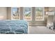 Bedroom with 3 windows, a view, and a blue patterned duvet at 66 New Settlement Rd, Kiawah Island, SC 29455