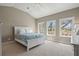 Bedroom features a bed, three windows, and an incredible view at 66 New Settlement Rd, Kiawah Island, SC 29455