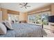 Bedroom boasts natural light, water view, and wooden bamboo bed frame at 66 New Settlement Rd, Kiawah Island, SC 29455