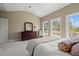 Inviting bedroom with vaulted ceilings, waterfront view, dresser, and chair at 66 New Settlement Rd, Kiawah Island, SC 29455
