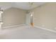 Bedroom with neutral colors, a ceiling fan, carpet, and an open doorway at 66 New Settlement Rd, Kiawah Island, SC 29455