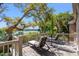 Relaxing deck space with lounge chairs offering serene waterfront views and mature trees at 66 New Settlement Rd, Kiawah Island, SC 29455