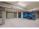 Spacious garage showcasing a blue truck, with ample parking and storage space at 66 New Settlement Rd, Kiawah Island, SC 29455