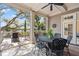 Inviting patio with outdoor seating, offering a relaxing space with views of the surrounding greenery at 66 New Settlement Rd, Kiawah Island, SC 29455