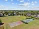 Aerial view of the community park showcasing the basketball court and tennis courts at 711 Farm Cottage Ln, Charleston, SC 29412