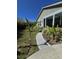 Landscaped backyard with walkway leading to the home at 711 Farm Cottage Ln, Charleston, SC 29412