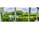 Inviting backyard featuring a sparkling pool, comfortable outdoor seating, and lush landscaping for relaxation and entertainment at 711 Farm Cottage Ln, Charleston, SC 29412