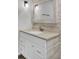 Elegant bathroom vanity features stylish mirror, modern fixtures, and white wooden accent wall at 8644 Roanoke Dr, North Charleston, SC 29406
