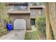 Charming townhome featuring a one-car garage and mature landscaping at 8644 Roanoke Dr, North Charleston, SC 29406