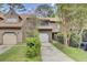 Charming townhome with garage, driveway, and mature trees at 8644 Roanoke Dr, North Charleston, SC 29406