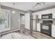 Kitchen featuring stainless steel refrigerator, black oven, and large corner window at 8644 Roanoke Dr, North Charleston, SC 29406