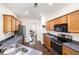 Functional kitchen with wood cabinets, stainless steel appliances, and stylish countertops at 8986 N Red Maple Cir, Summerville, SC 29485