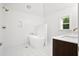 Stylish bathroom with freestanding tub, separate shower, and modern fixtures at 920 Julia St, Charleston, SC 29412