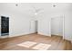Spacious bedroom boasts wood floors, white walls and walk-in closet at 920 Julia St, Charleston, SC 29412