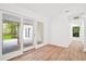 Bright living room with sliding glass doors leading to patio at 920 Julia St, Charleston, SC 29412