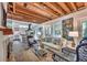Open-concept living area flows into kitchen with white cabinets at 95 Ashley Ave # D, Charleston, SC 29401