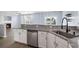 Updated kitchen featuring granite countertops, stainless steel appliances, and ample cabinet space at 9731 Stockport Cir, Summerville, SC 29485