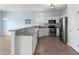 Well-equipped kitchen featuring stainless steel appliances, granite counters, and ample white cabinetry at 9731 Stockport Cir, Summerville, SC 29485