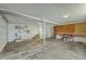 Spacious garage with workbench and utility sink offering ample storage and workspace at 100 Lipman St, Summerville, SC 29483