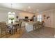Open kitchen featuring white cabinets, stainless steel appliances, a large island, and a breakfast nook at 10032 Randall, McClellanville, SC 29458