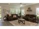 Comfortable living room featuring plush seating, neutral walls, and plenty of natural light at 10032 Randall, McClellanville, SC 29458