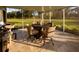 Relaxing screened-in patio for outdoor dining at 10032 Randall, McClellanville, SC 29458