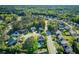 Expansive aerial view of a residential community featuring lush greenery and well-maintained homes at 101 Writing Ct, Ladson, SC 29456
