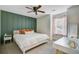 Relaxing bedroom features stylish wall accents, a ceiling fan, and plenty of natural light at 101 Writing Ct, Ladson, SC 29456
