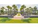 A community park has picnic tables and is lined with Palm trees and park benches at 1055 Tea Time Dr, Summerville, SC 29485