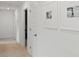 Bright hallway featuring neutral tones and decorative framed pictures on the wall at 1055 Tea Time Dr, Summerville, SC 29485