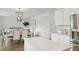 Open concept living and dining area features stylish lighting and ample space for entertaining at 1055 Tea Time Dr, Summerville, SC 29485