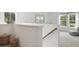 Upstairs loft area features cozy decor, natural lighting, and comfortable seating at 1055 Tea Time Dr, Summerville, SC 29485