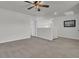 Bright bonus room with neutral walls, carpet, and a ceiling fan at 106 Lakelyn Rd, Moncks Corner, SC 29461