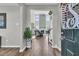 Inviting foyer with hardwood floors, high ceilings, and a view of the spacious living area beyond at 106 Lakelyn Rd, Moncks Corner, SC 29461