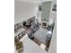 Aerial view of the open-concept living space, featuring a fireplace, seating, dining area, and kitchen at 106 Lakelyn Rd, Moncks Corner, SC 29461