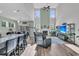 Open-concept living room featuring a fireplace, comfortable seating, and a view of the adjacent dining area at 106 Lakelyn Rd, Moncks Corner, SC 29461